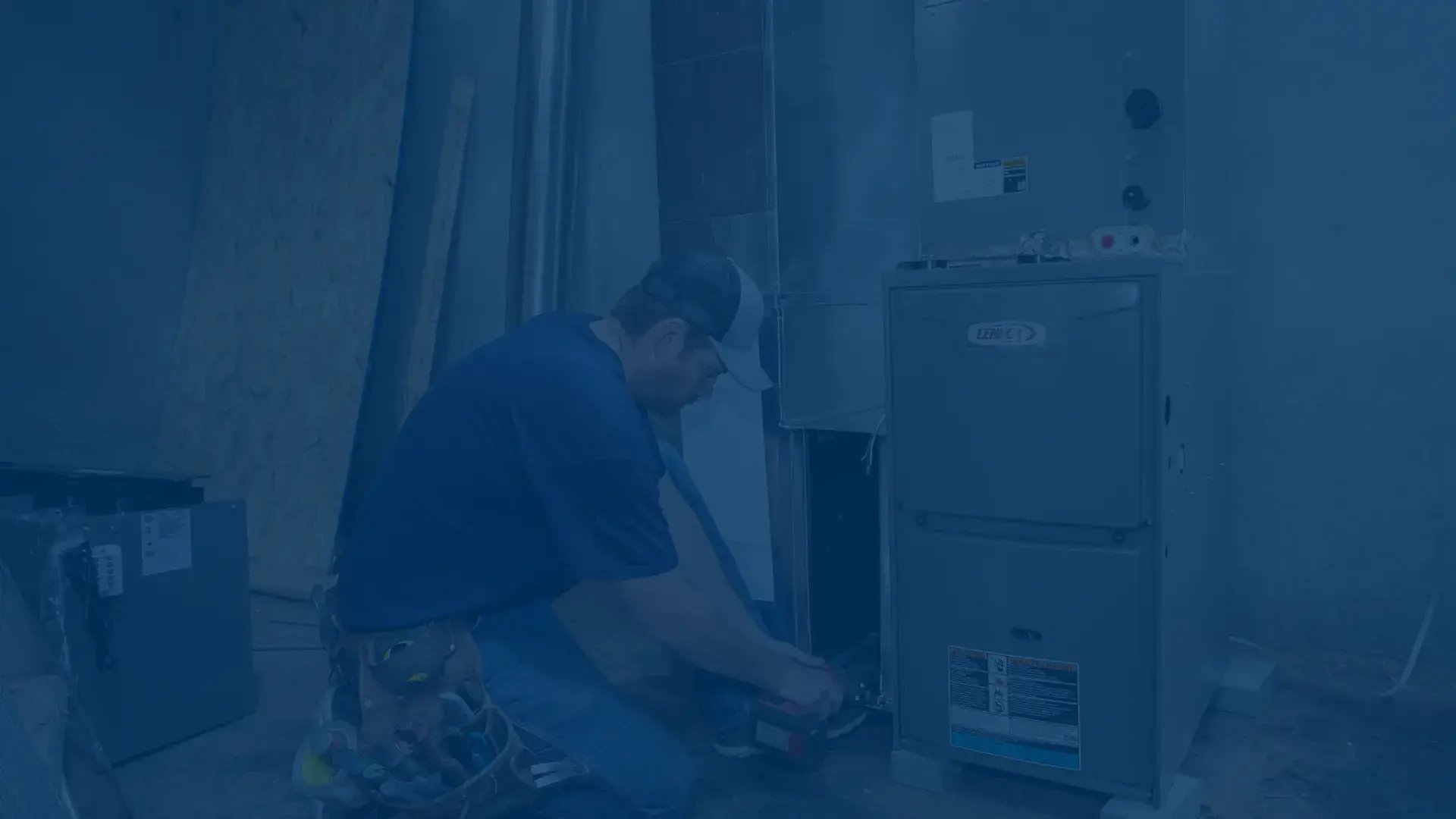 United Heating technician performing an emergency furnace repair